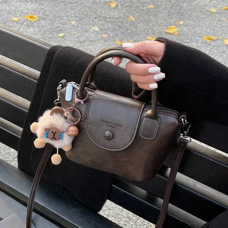 Popular explosions bag female retro 2024 autumn and winter new bag cover leisure messenger bag Korean portable bucket bagW250926