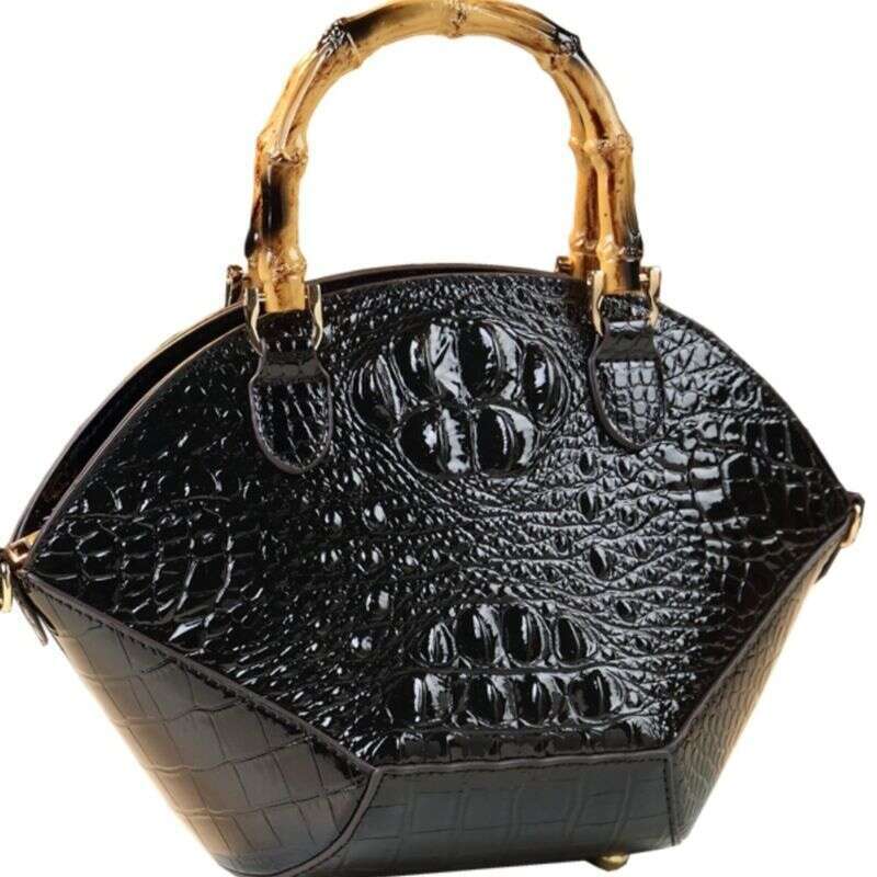 Hard skin women's bag new fashionable bamboo section handbag atmospheric niche design shell shoulder cross