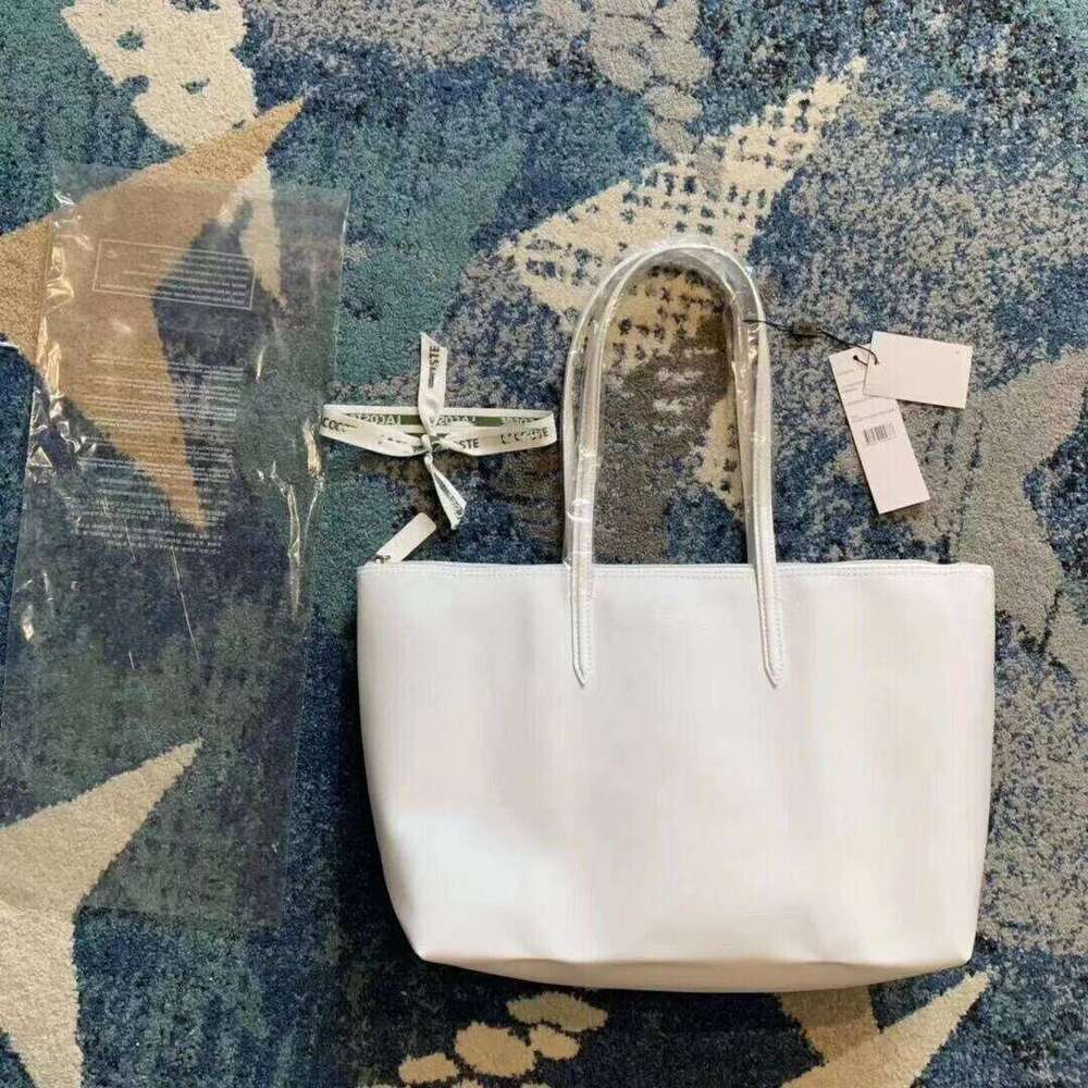 2025 Fashion Women's Totes Large Capacity Purse And Handbags Soild Leather Single Shoulder Bag A4 Commuting Class Schoolbags Suotong0917