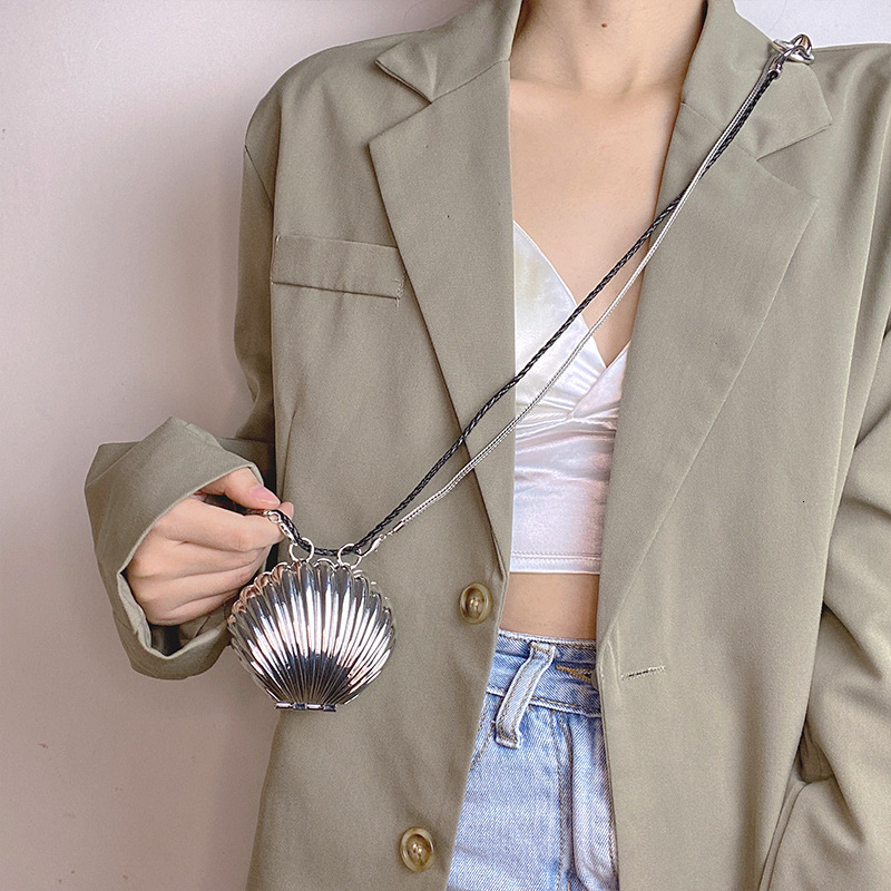 2025 French autumn and winter women's metal shell bag new fashion, light luxury, retro style chain shoulder crossbody bag mini wallet designer ba