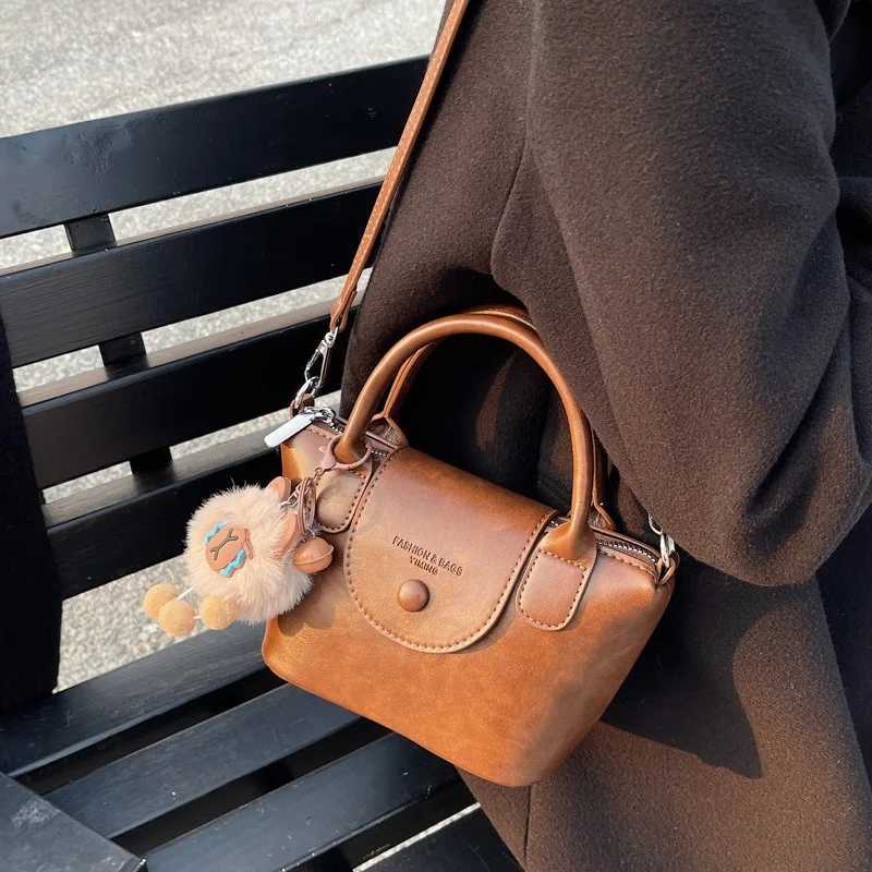 Popular explosions bag female retro 2024 autumn and winter new bag cover leisure messenger bag Korean portable bucket bagW250926