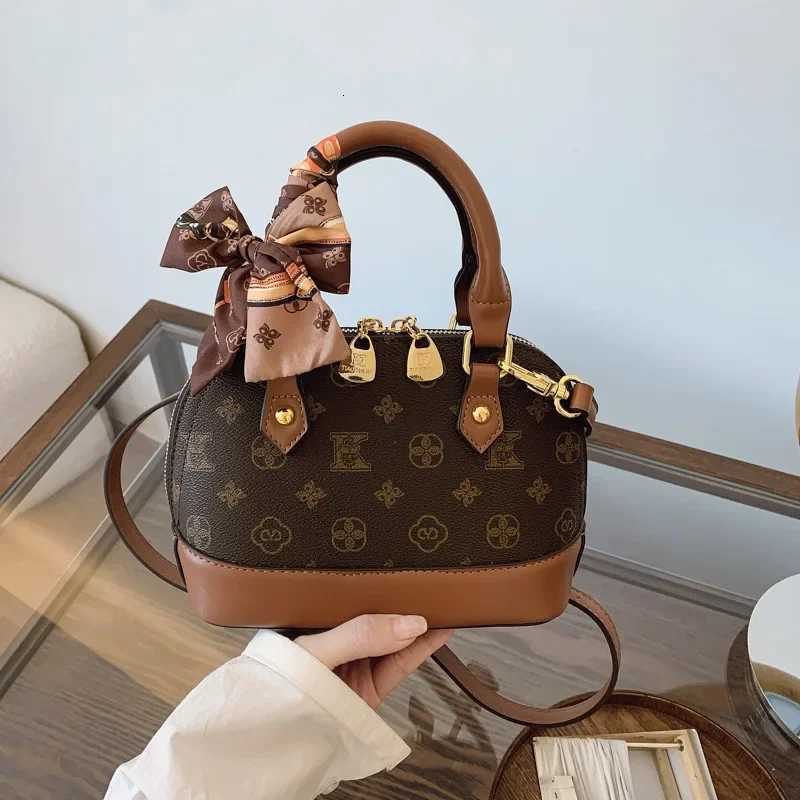 2025 New Womens Retro Print Shell Bag Light Luxury Portable ShoulderCrossbodyW250926