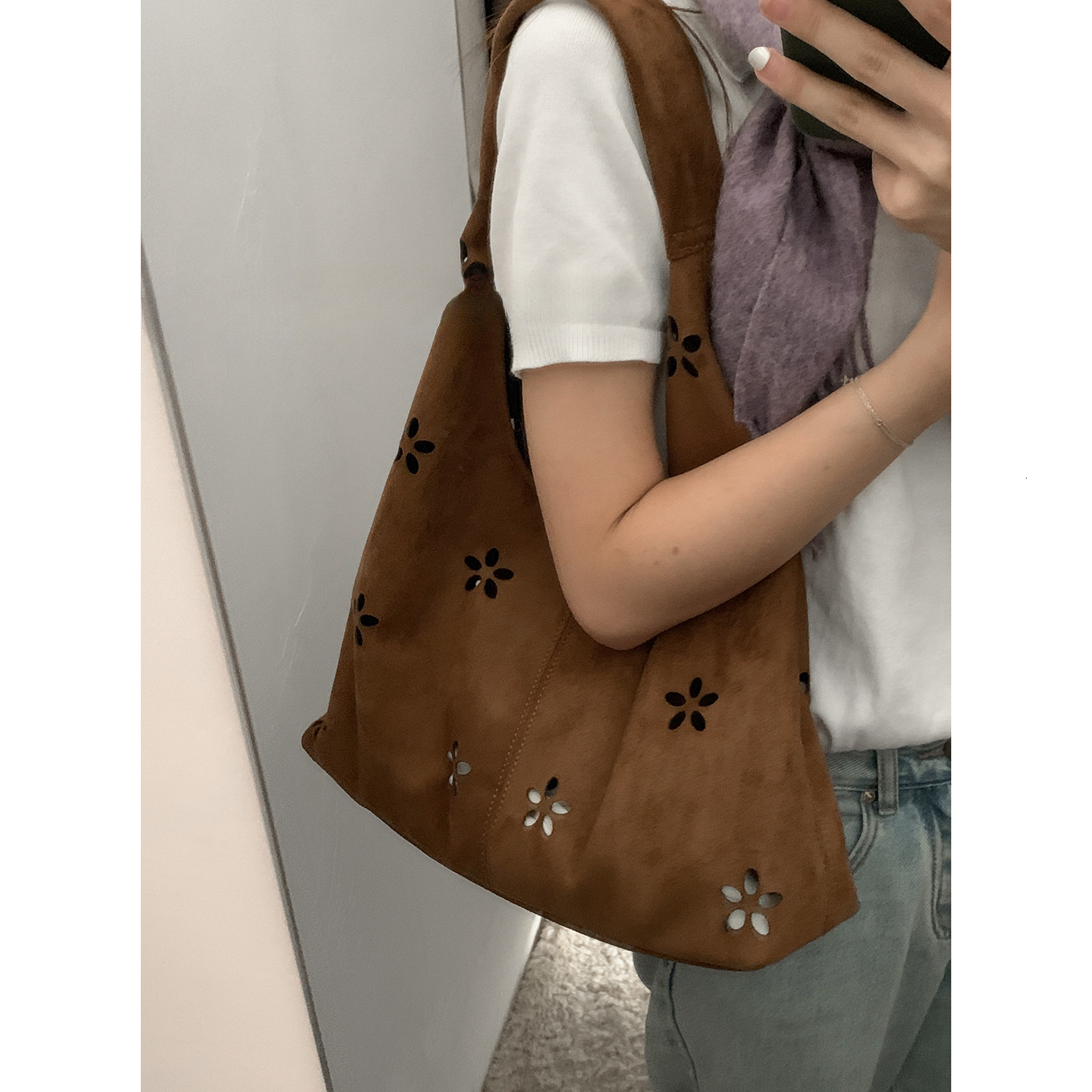 French style large capacity underarm commuting bag with retro and trendy design, autumn new style suede design, hollow handbag, light luxury designer 