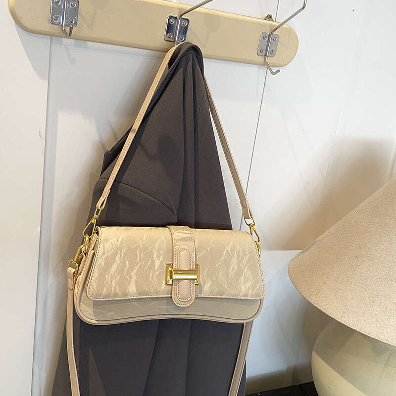 Baguette Women's 2025 New High-Quality Designer Bags Texture Niche Crossbody Single Shoulder Underarm Bag