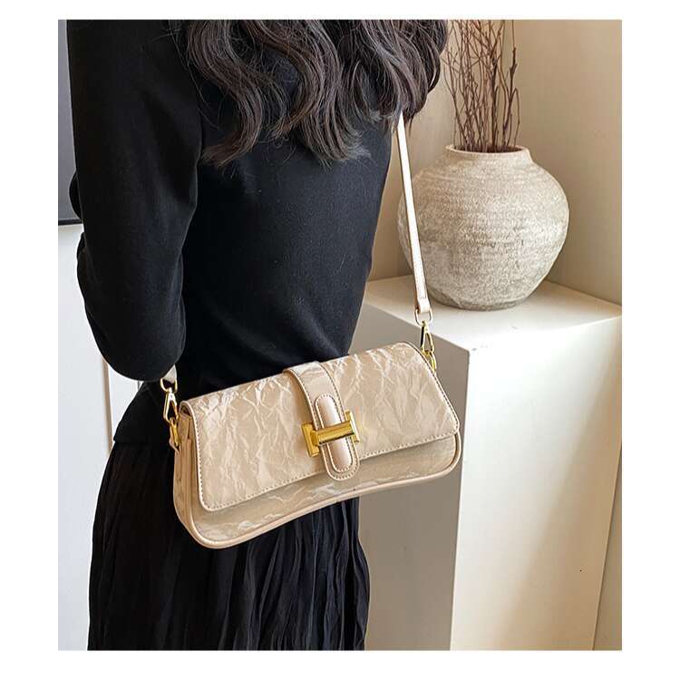 Baguette Women's 2025 New High-Quality Designer Bags Texture Niche Crossbody Single Shoulder Underarm Bag