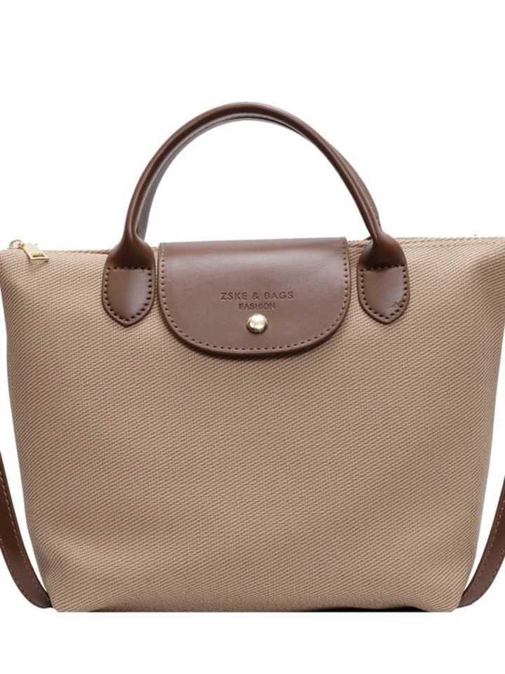 Fashion Commuting bag for women 2025 New Casual Canvas Crossbody Bag Small Handbag and Purse Ladies Handheld Dumpling BagW250926