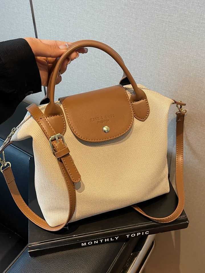 Fashion Commuting bag for women 2025 New Casual Canvas Crossbody Bag Small Handbag and Purse Ladies Handheld Dumpling BagW250926