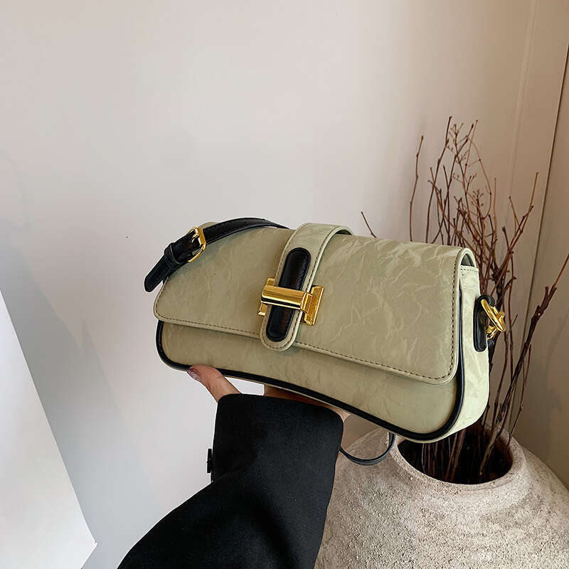 Baguette Women's 2025 New High-Quality Designer Bags Texture Niche Crossbody Single Shoulder Underarm Bag