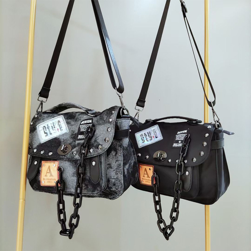 2025 autumn and winter women's new European and American retro denim diagonal cross bag bag fashion handbag personality rivet chain large capacit