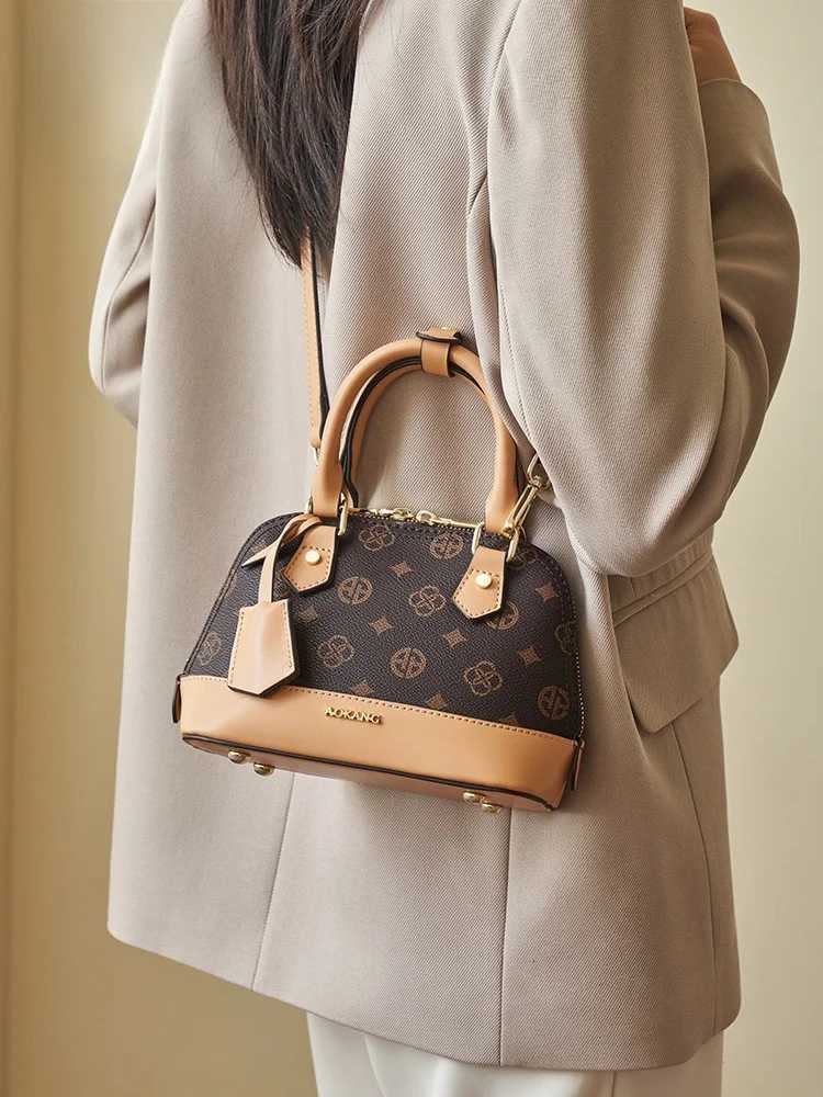 Aokang ell Handbag 2025 New Faion Large Capaci Womens Handbag Vintage Artistic Sle Commuting Single oulder BagW250926