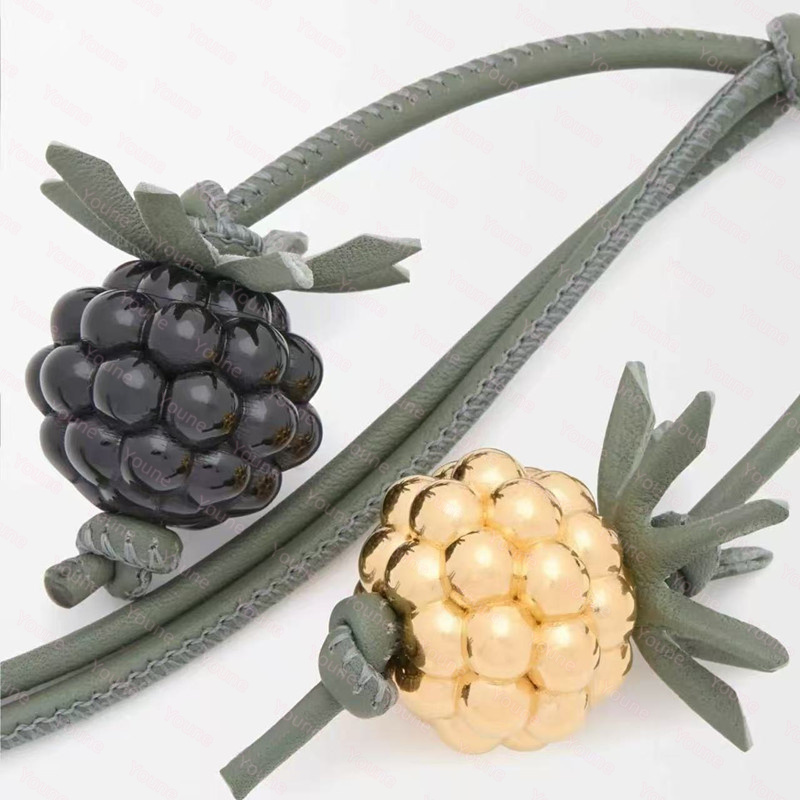 Berry Raspberry Blk berry Tomato Bag Charm Designer For Womens Fashion Decoration looped calfskin strap and Anagram Pebble dice Pendant Hang L250929HQ