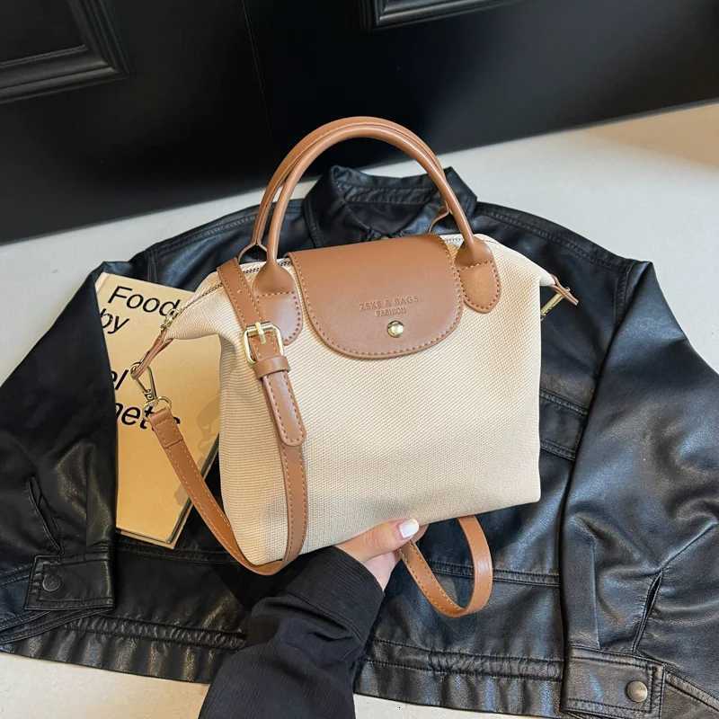 Fashion Commuting bag for women 2025 New Casual Canvas Crossbody Bag Small Handbag and Purse Ladies Handheld Dumpling BagW250926