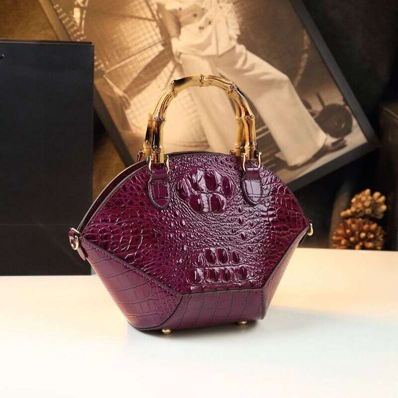 Hard skin women's bag new fashionable bamboo section handbag atmospheric niche design shell shoulder cross