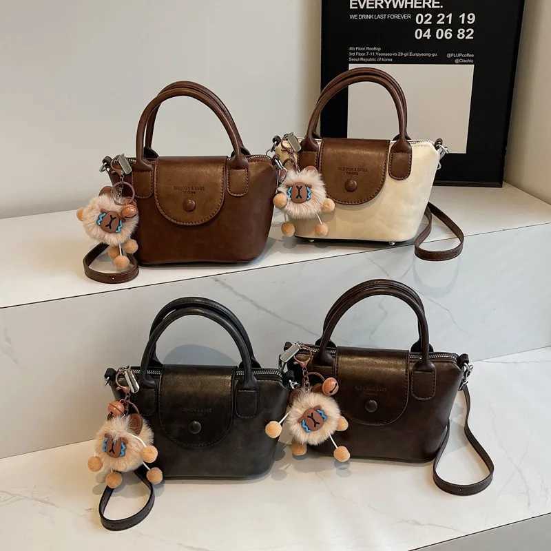 Popular explosions bag female retro 2024 autumn and winter new bag cover leisure messenger bag Korean portable bucket bagW250926