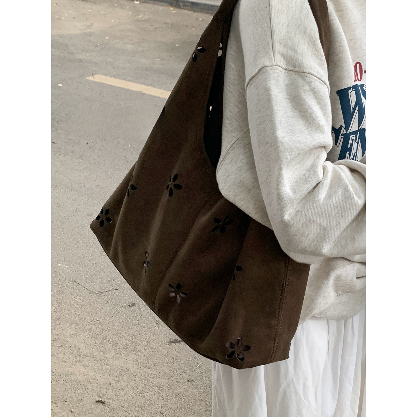 French style large capacity underarm commuting bag with retro and trendy design, autumn new style suede design, hollow handbag, light luxury designer 