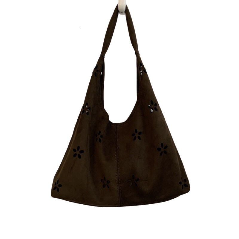 French style large capacity underarm commuting bag with retro and trendy design, autumn new style suede design, hollow handbag, light luxury designer 