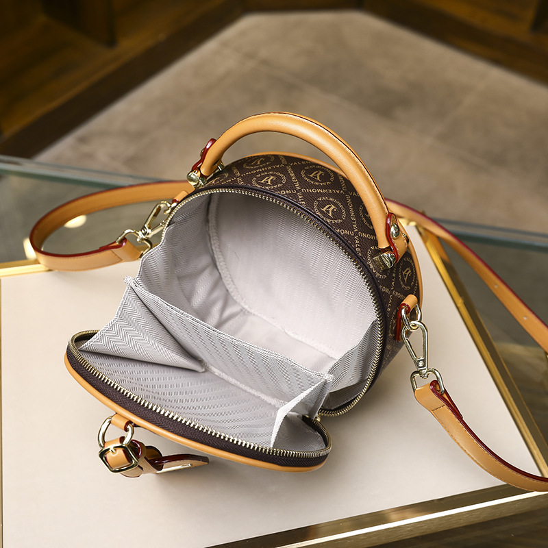 Designer bag retro small round bag printed new women's bag temperament single shoulder fashion messenger round cake small bag commuting versatile