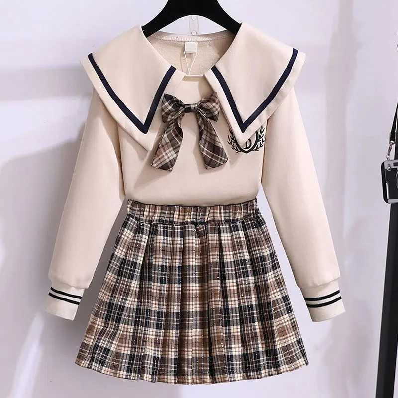 Childrens Set Girls Korean Spring Autumn Flip Neck Bow TopCheckered Short Skirt Set Big Kids Fashion Two Piece Skirt Set L250926ZX85