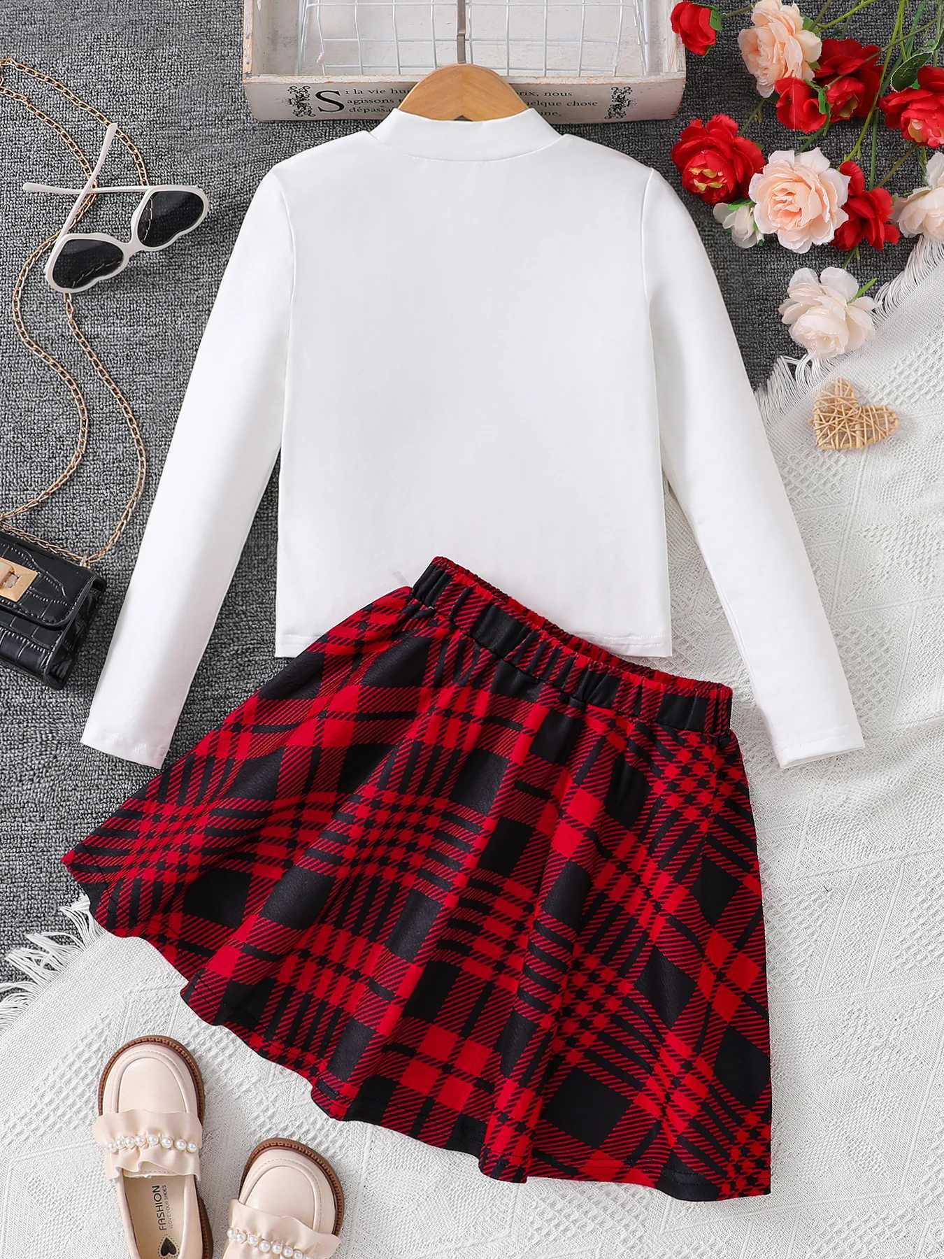 Childrens clothing autumn girls fashion set white cartoon printed knitted round neck topred checkered pleated skirt 2piece L250926PD0O