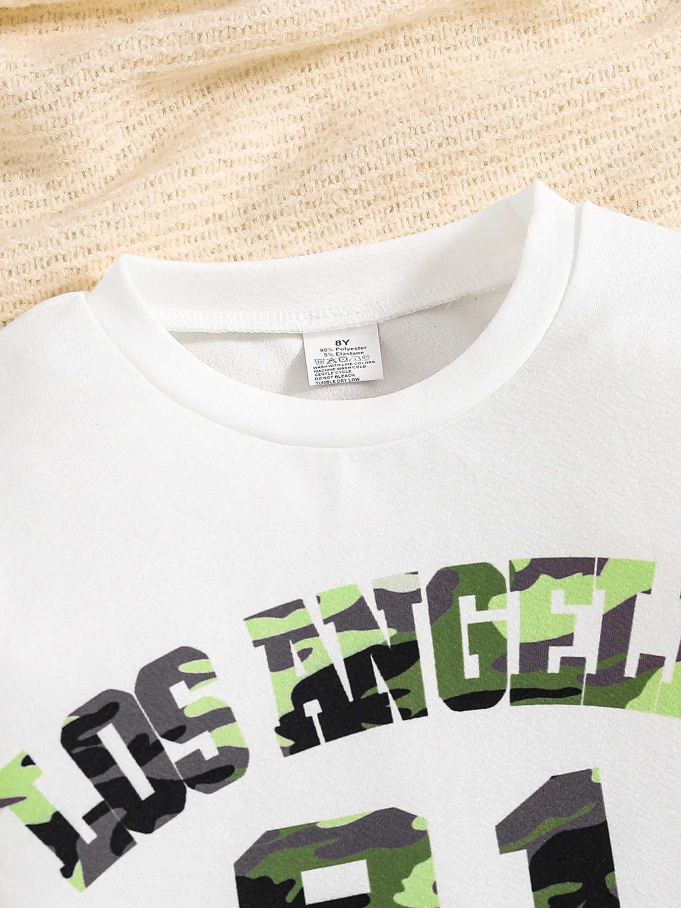 Girls 2Piece Fashion Set Spring Autumn White LetterPrinted Knitted round Neck Long Sleeve Top Camouflage Skirt Ensemble L250926X64Q