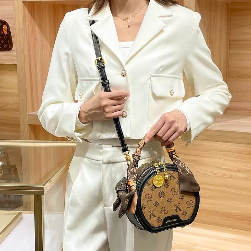 Designer bags women's bags 2025 new popular shoulder messenger bags versatile printed small round bags round cake bags fast delivery