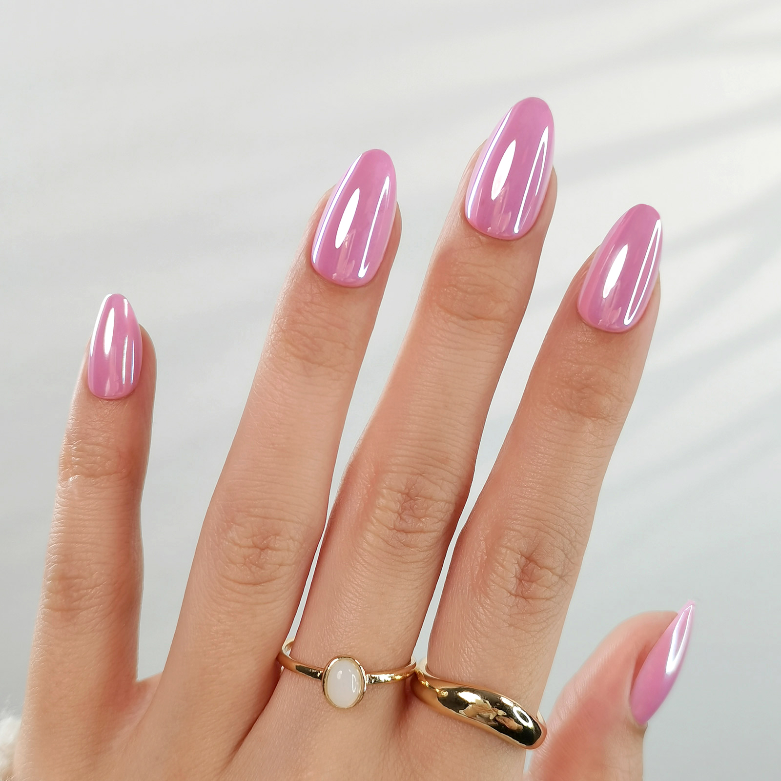 Iridescent press-on short almond nail tips with a natural nail shape, solid purple full stickers, reusable nails.