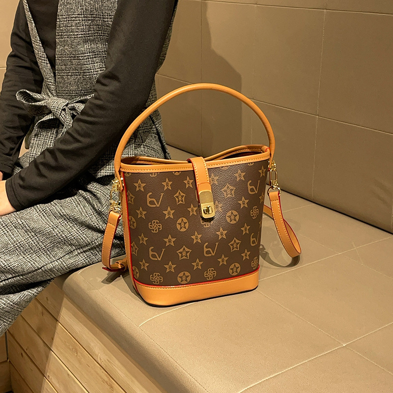 Designer bags2025 new product, new in the season, printed letter bucket bag, fashionable 100 shoulder and messenger bag women