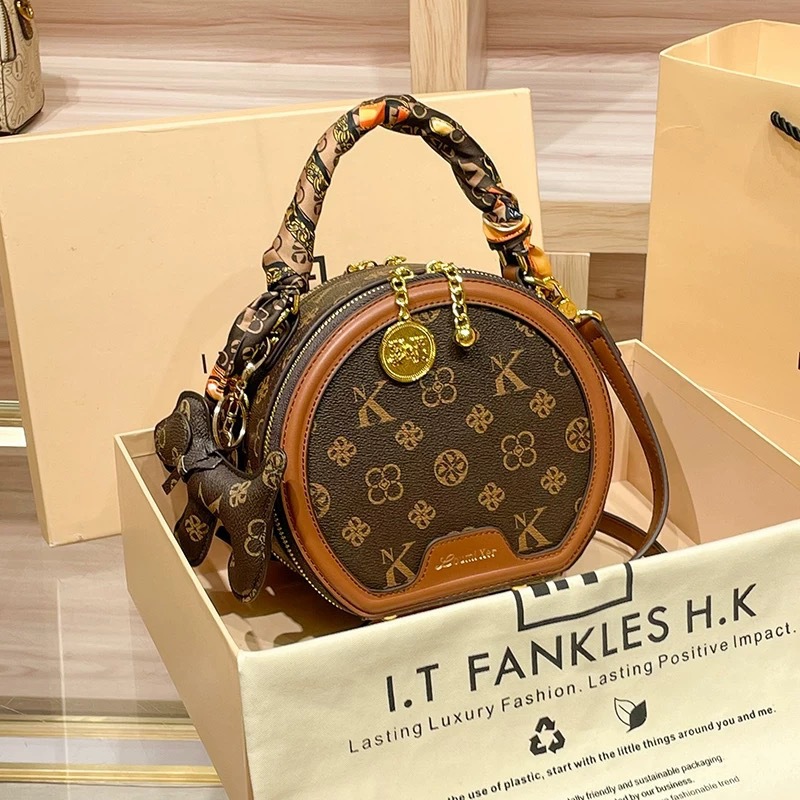 Designer bags women's bags 2025 new popular shoulder messenger bags versatile printed small round bags round cake bags fast delivery