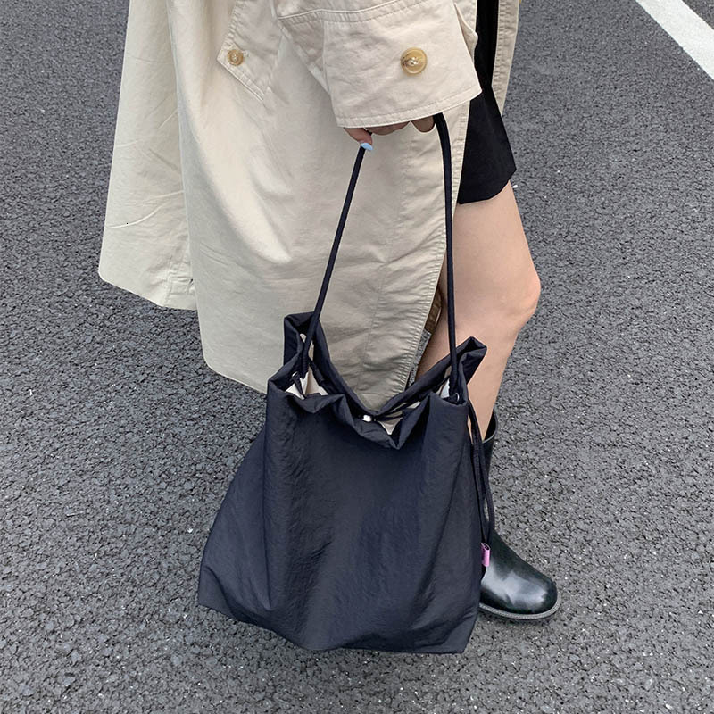 Minimalist Luxury bag fresh and plain baby art handbag women s lazy style women s shoulder bag college style class handbag large bag designer bag Desi