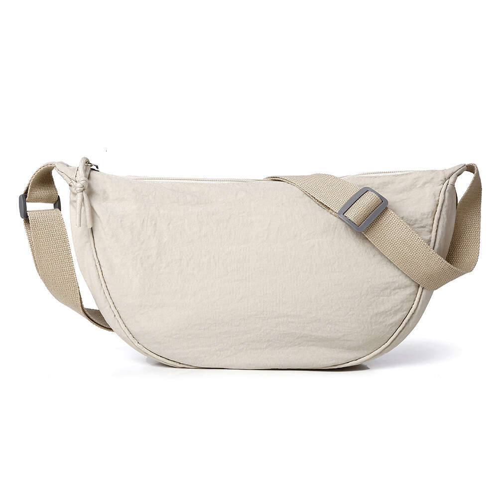 designer bag Luxury bag Fashion Simple Crossbody Trendy Versatile Single Shoulder Dumpling New Lightweight Commuting Underarm Canvas Bag