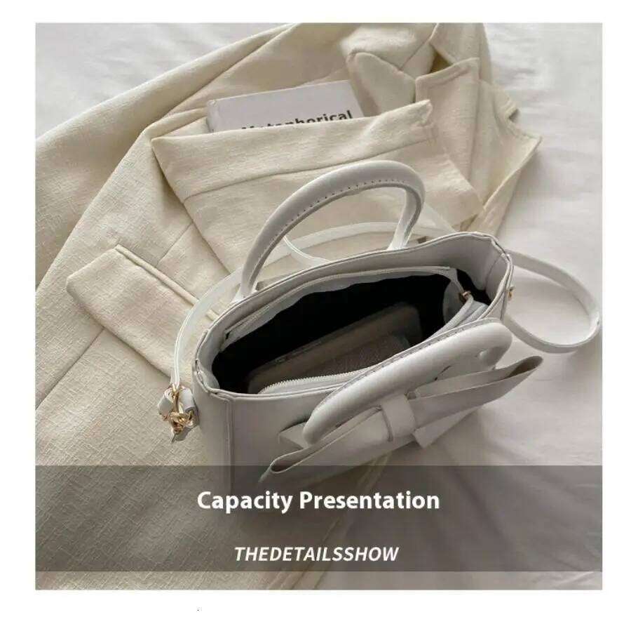 Fashionable retro single shoulder small square bag with bow design, hand-held crossbody bag, handbag