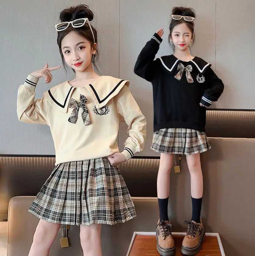 Childrens Set Girls Korean Spring Autumn Flip Neck Bow TopCheckered Short Skirt Set Big Kids Fashion Two Piece Skirt Set L250926ZX85