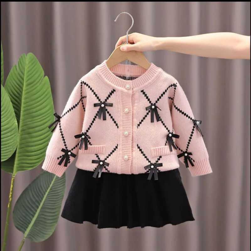 Girls Sweater Set for AutumnWinter 2025 New Childrens Bow Knitted Round Neck CardiganSkirt 2piece Set L250926BT6U