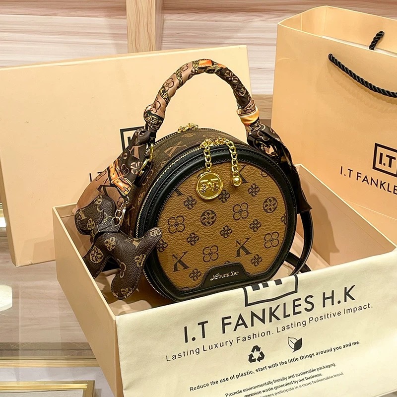 Designer bags women's bags 2025 new popular shoulder messenger bags versatile printed small round bags round cake bags fast delivery