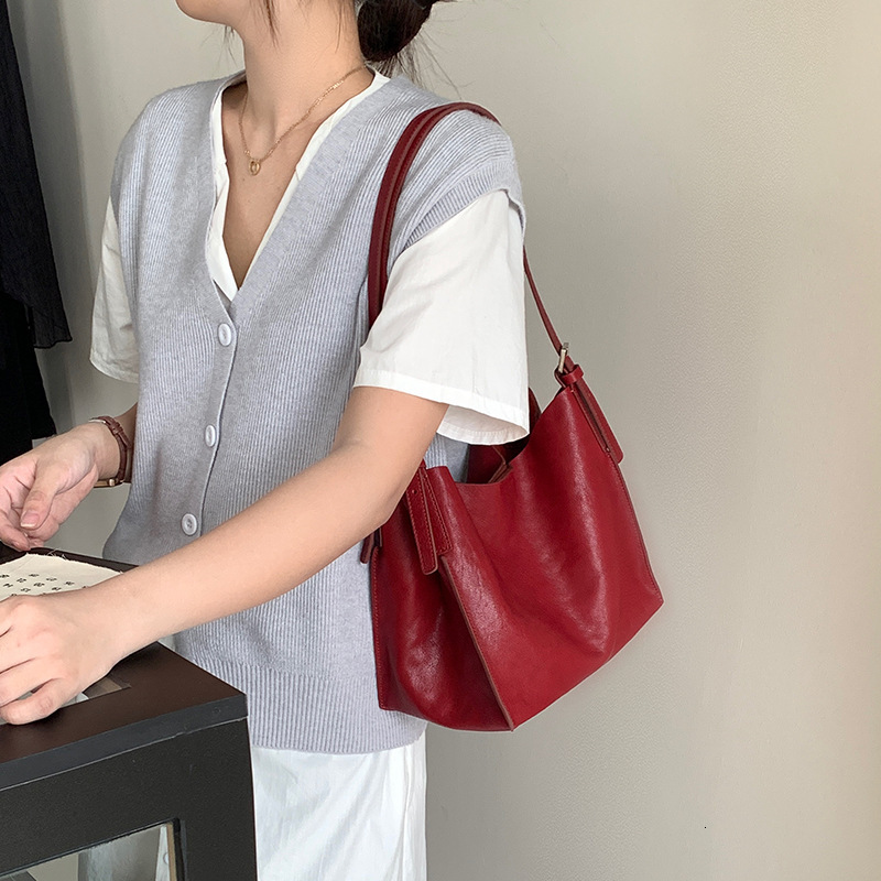 Vintage leather homeless handbag new niche casual minimalist commuting basket bag Luxury bag women s shoulder bag new designer bag Designer Bag