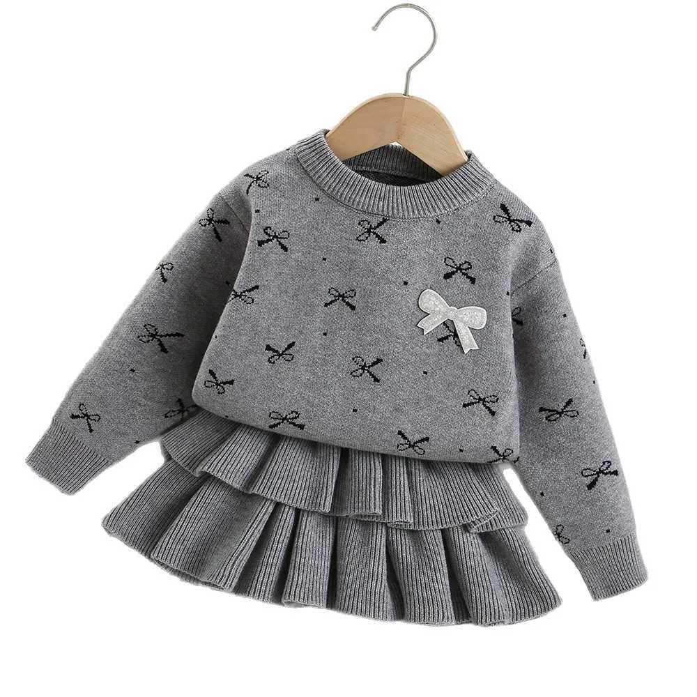 Autumn Kids Girls 2PCS Clothes Set Bow Printed Round Collar Knitwear Sweater Suits Korean Infant Babys Girls Solid Cake Skirts L250926P8HE