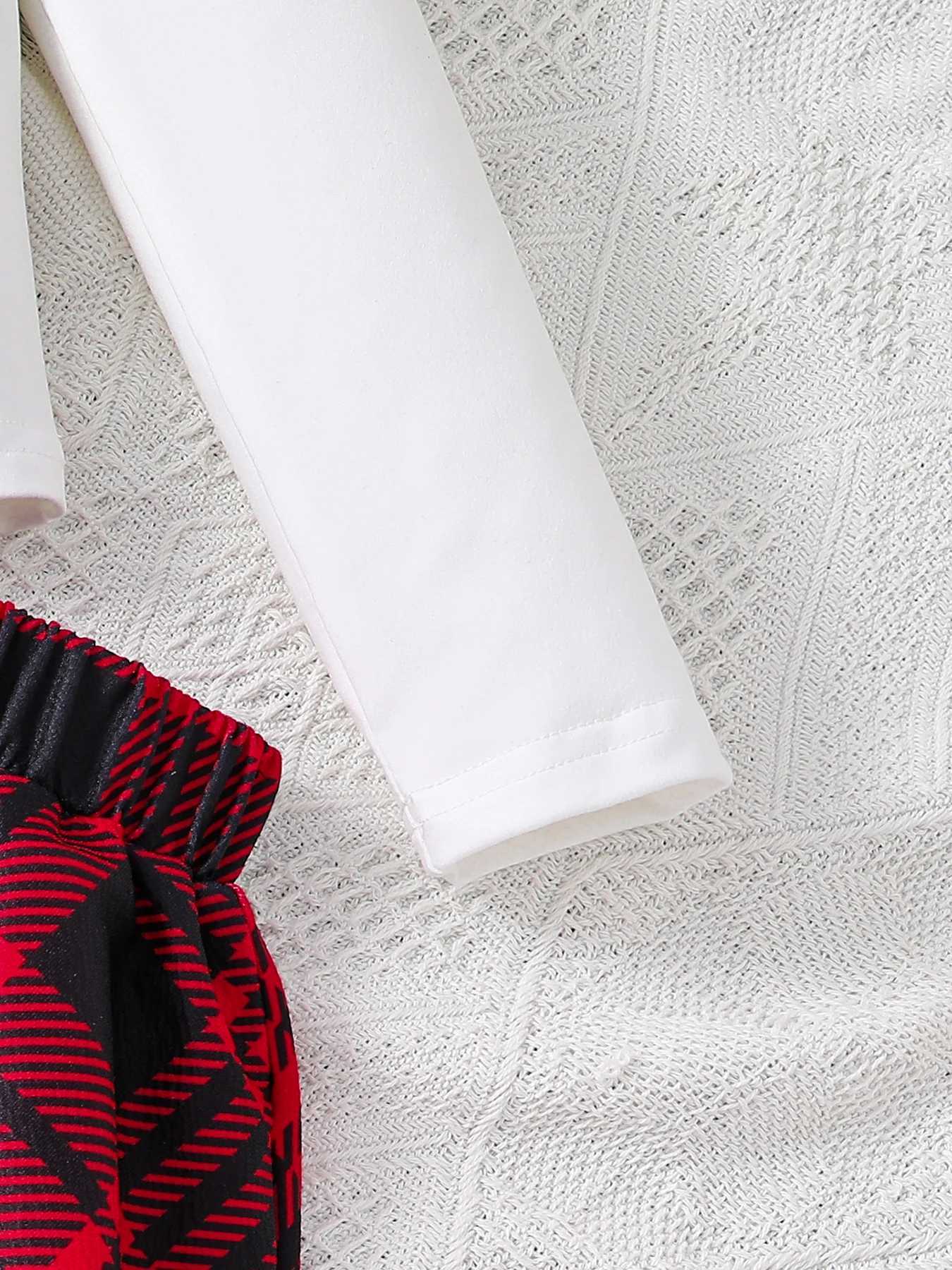 Childrens clothing autumn girls fashion set white cartoon printed knitted round neck topred checkered pleated skirt 2piece L250926PD0O