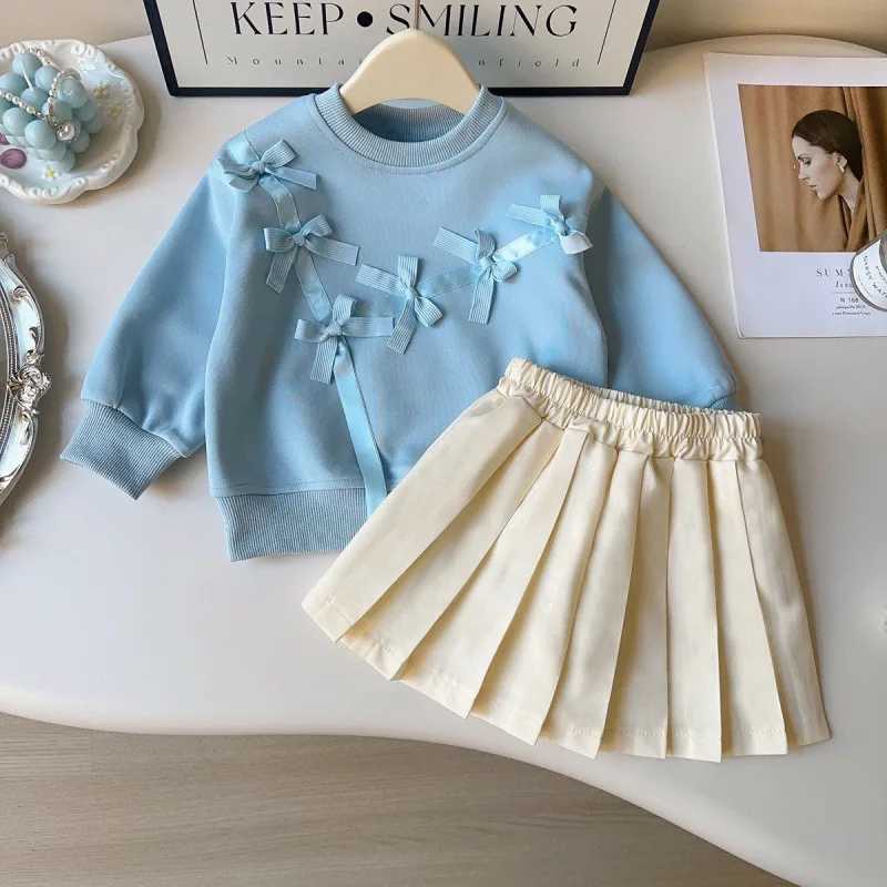 Childrens Outfit Skirt New Spring Girls Fashion Round Neck Long Sleeve Sweatshirt with Bow Tie Pleated Skirt TwoPiece Set L2509269SOG