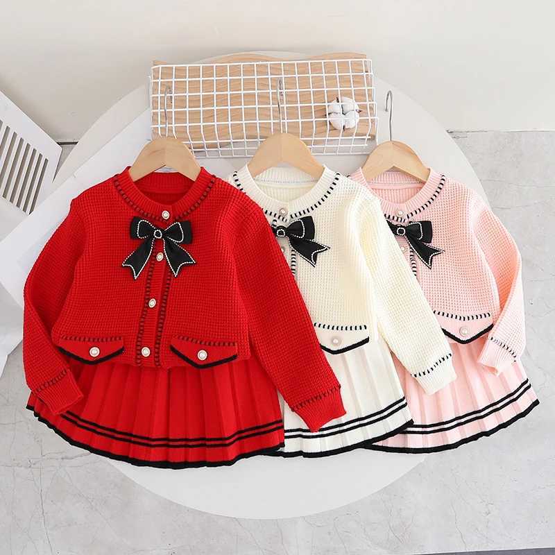 Christmas Suit Knitted Single row pearl buckle Baby Gir Clothes Red bow knitted sweaterPleated Skirt Baby New Year Set 2Pcs L250926J2KT
