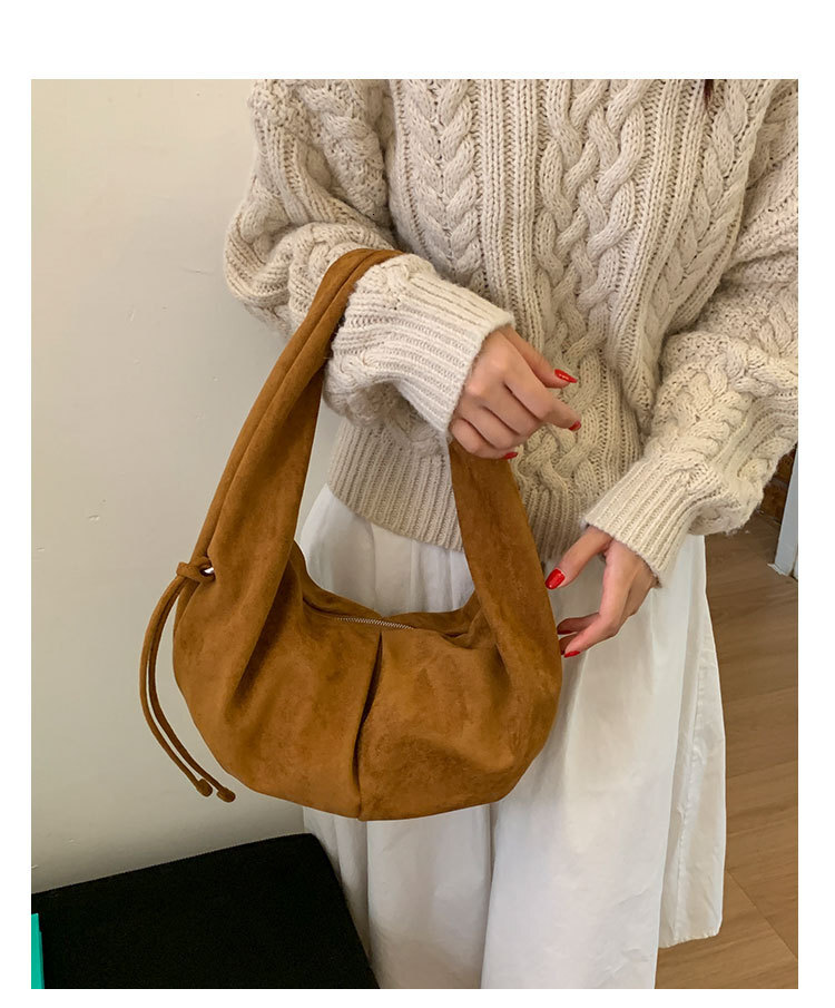 Korean style suede half moon shaped women s armpit bag autumn and winter new style suede retro simple Luxury bag pleated handbag designer bag Designer