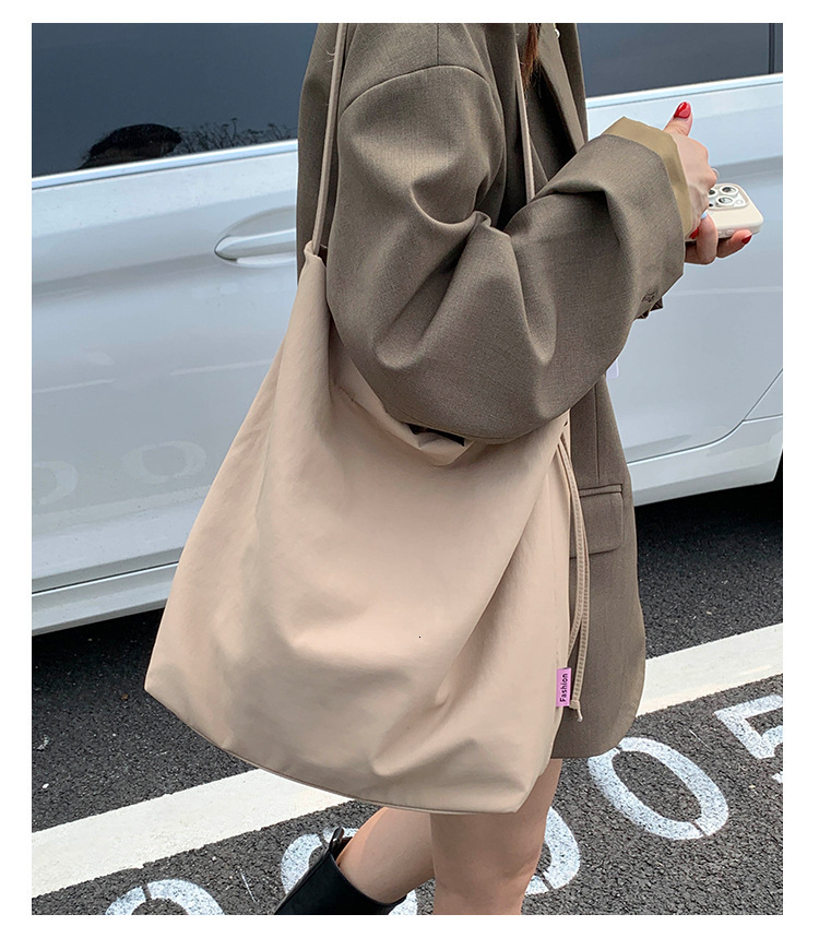 Minimalist Luxury bag fresh and plain baby art handbag women s lazy style women s shoulder bag college style class handbag large bag designer bag Desi