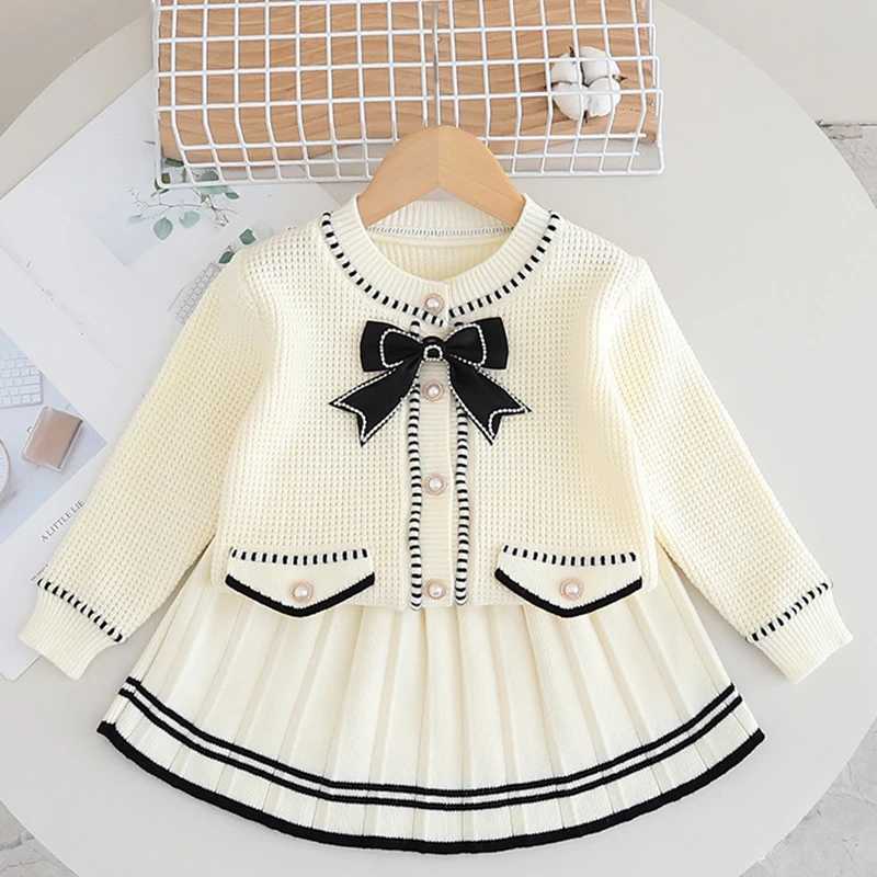 Christmas Suit Knitted Single row pearl buckle Baby Gir Clothes Red bow knitted sweaterPleated Skirt Baby New Year Set 2Pcs L250926J2KT