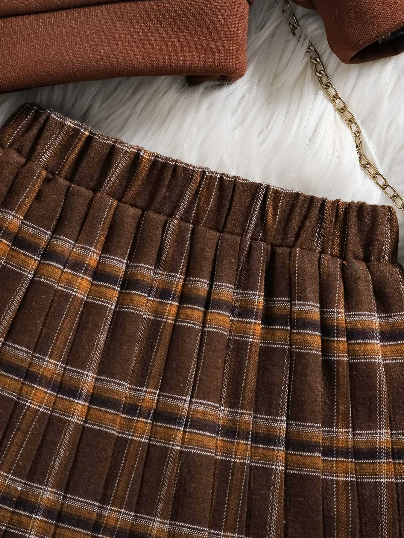 Childrens clothing for spring and autumn girls fashion cute solid color set lapel long sleeved topplaid pleated skirt two L250926EIQS