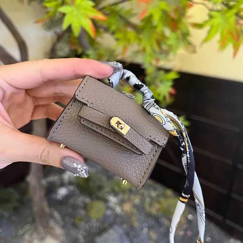 Luxury Mini long Kelly bag charm cute earphone pouch highquality leather creative car keychain ornament Y250929as
