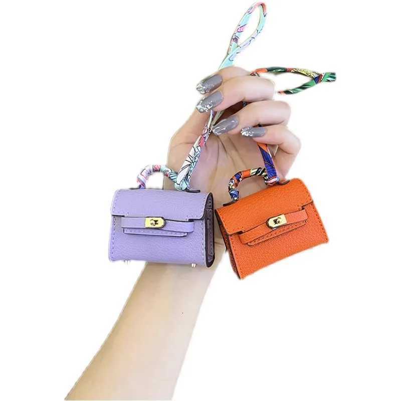 Luxury Mini long Kelly bag charm cute earphone pouch highquality leather creative car keychain ornament Y250929as