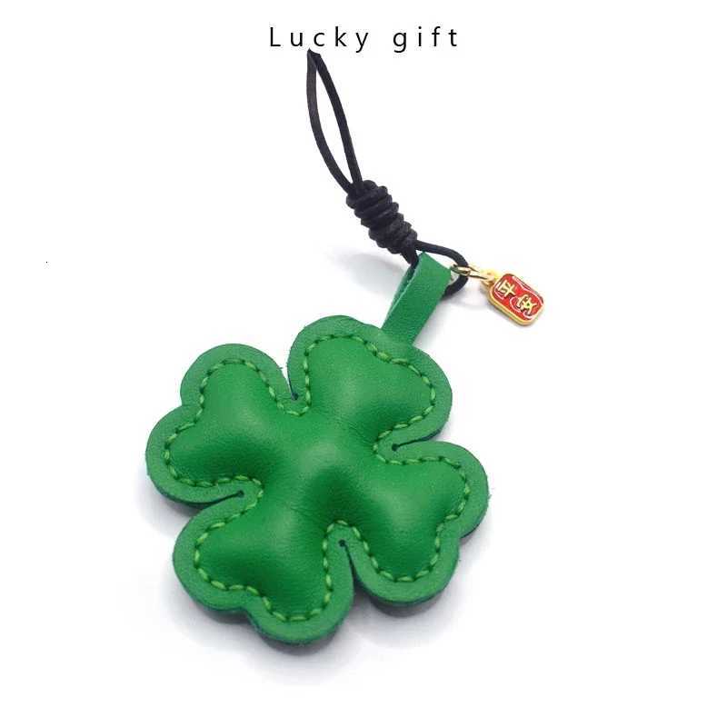 Luxury Doublesided Fourleaf Clover Genuine Leather Ins Bag Pendant Keychain Car Pendant Cowhide Plant Leaf Handbook Y250928as