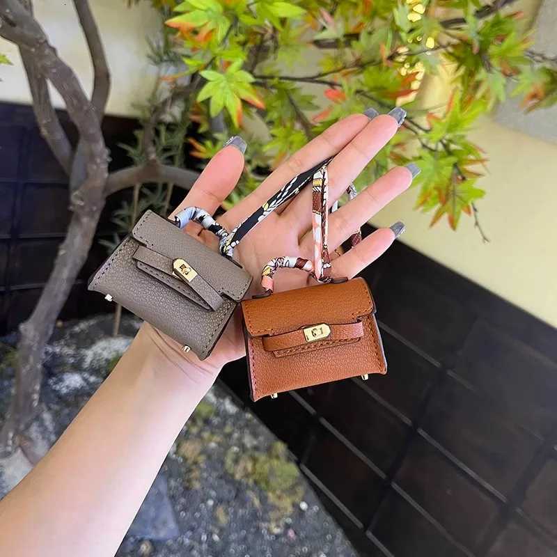 Luxury Mini long Kelly bag charm cute earphone pouch highquality leather creative car keychain ornament Y250929as