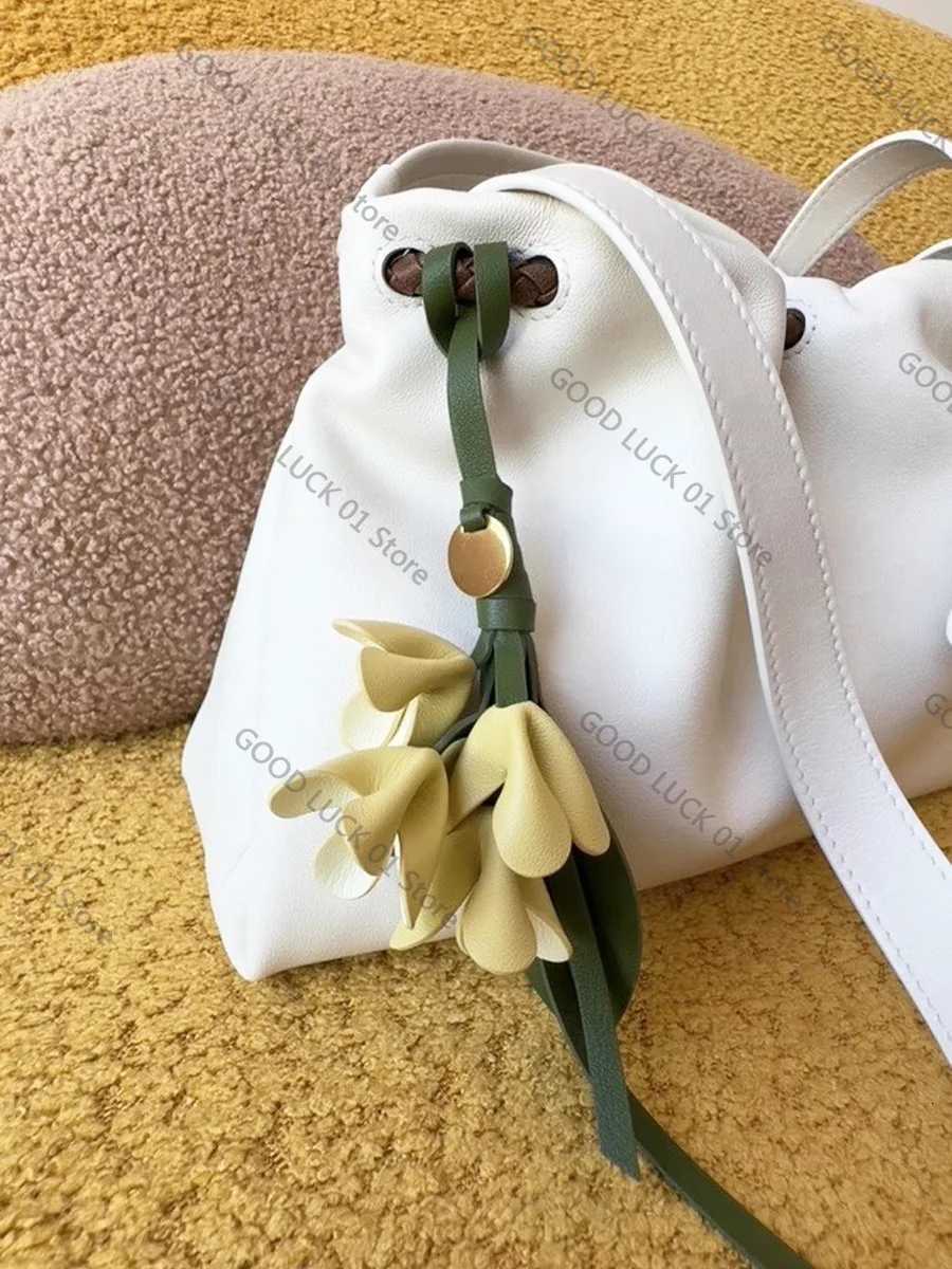Luxury 2025 Flower Bag Pendant Cow Leather Design Exquisite Handmade Simulation Bags Pendant Osmanthus Tulip Keychain Bag Accessories Y250928