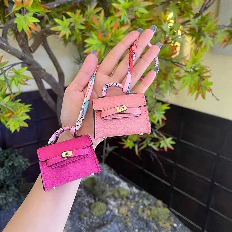 Luxury Mini long Kelly bag charm cute earphone pouch highquality leather creative car keychain ornament Y250929as