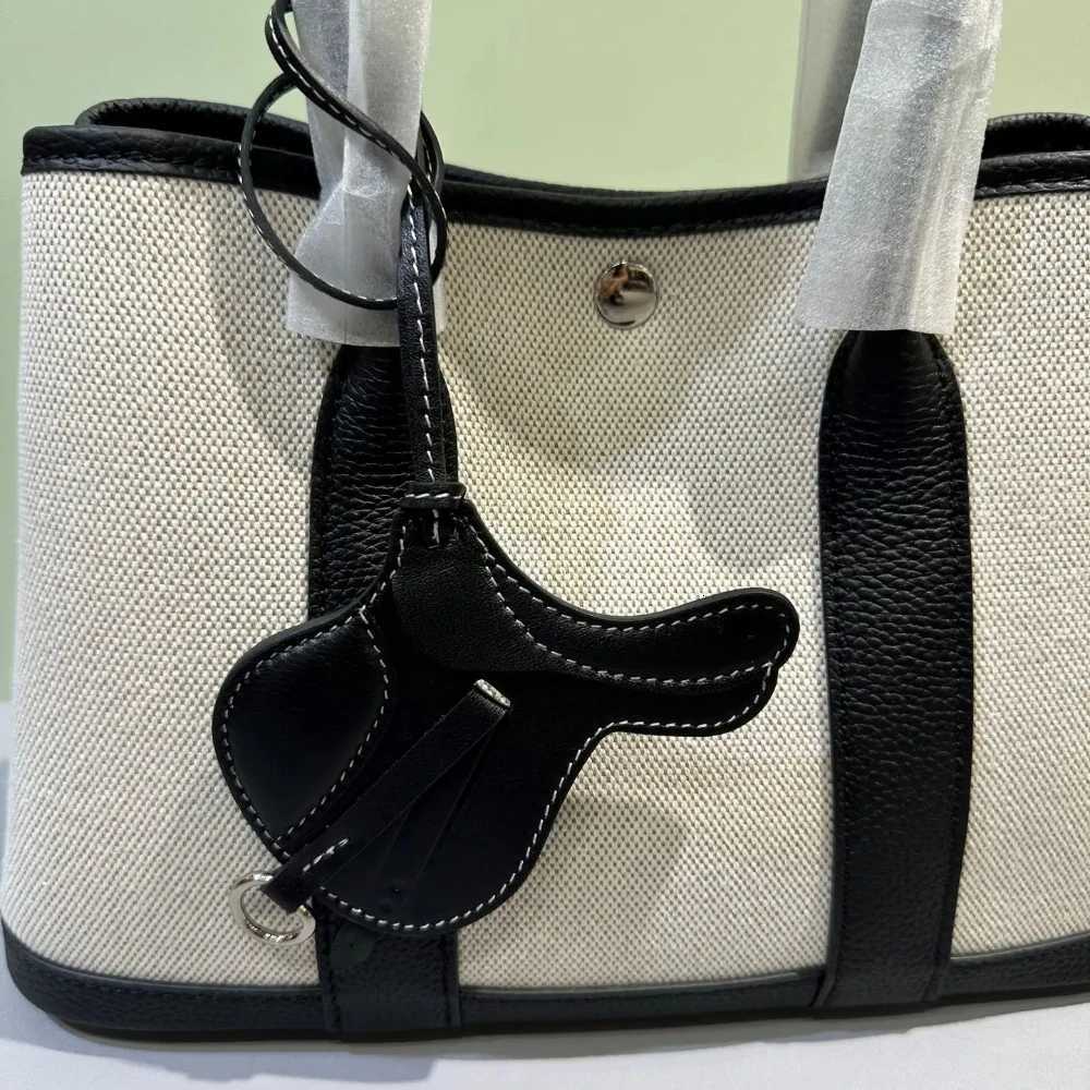 Luxury High Quality Bag Charm Saddle Bag Pendant Cute Car Key Chain Luxury Handmade Genuine Leather Sheepskin Bags Accessories Y250929as